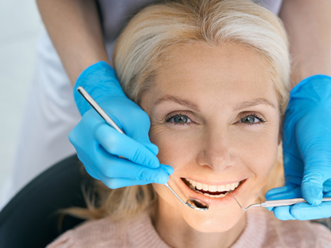 Woman receiving a dental checkup 