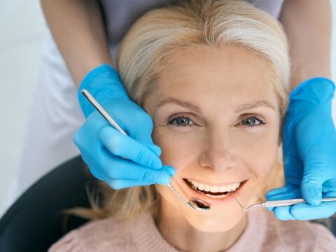 Woman smiling during dental checkup